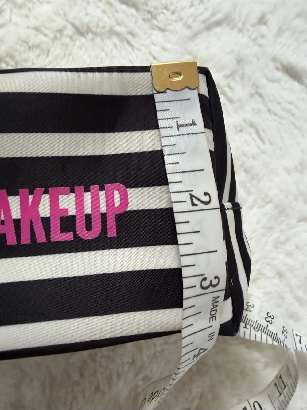 KATE SPADE,  black and white striped makeup pouch